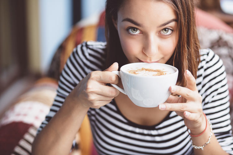 woman drinking coffee for energy